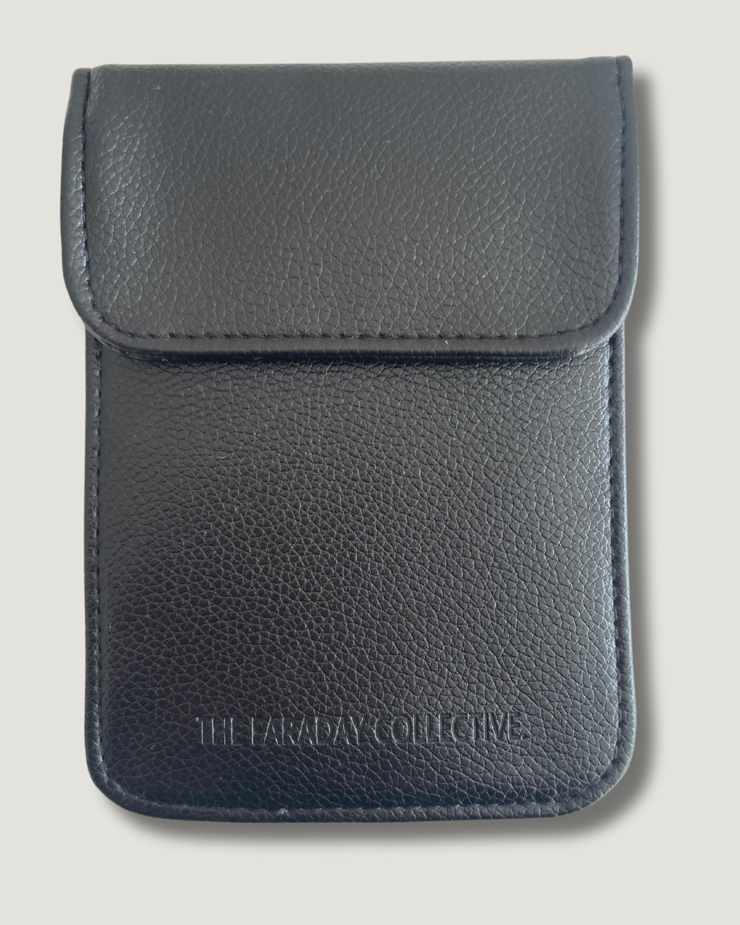 Tan Faraday pouch blocking RFID signals