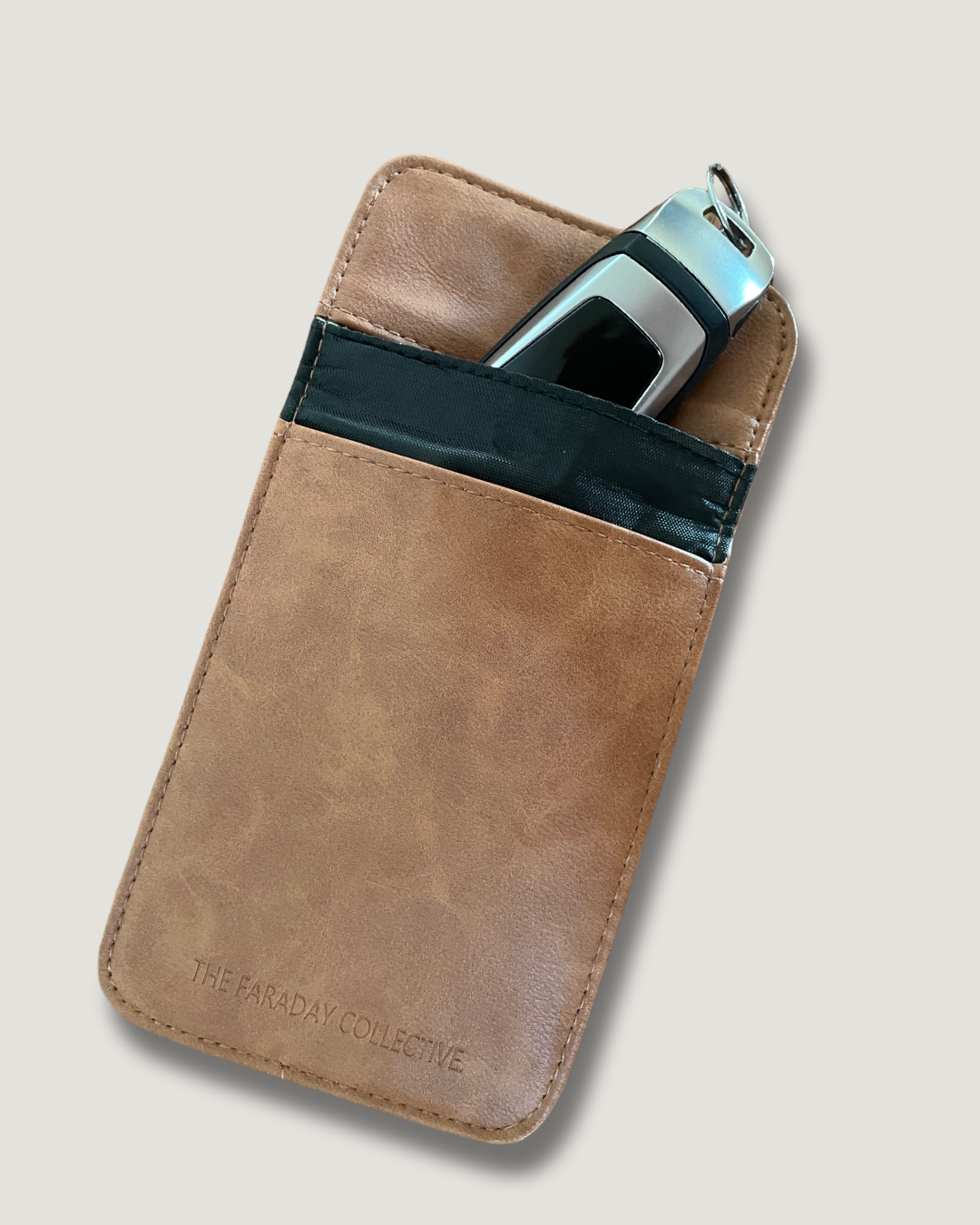 Tan Faraday pouch blocking RFID signals, protecting privacy and wireless theft