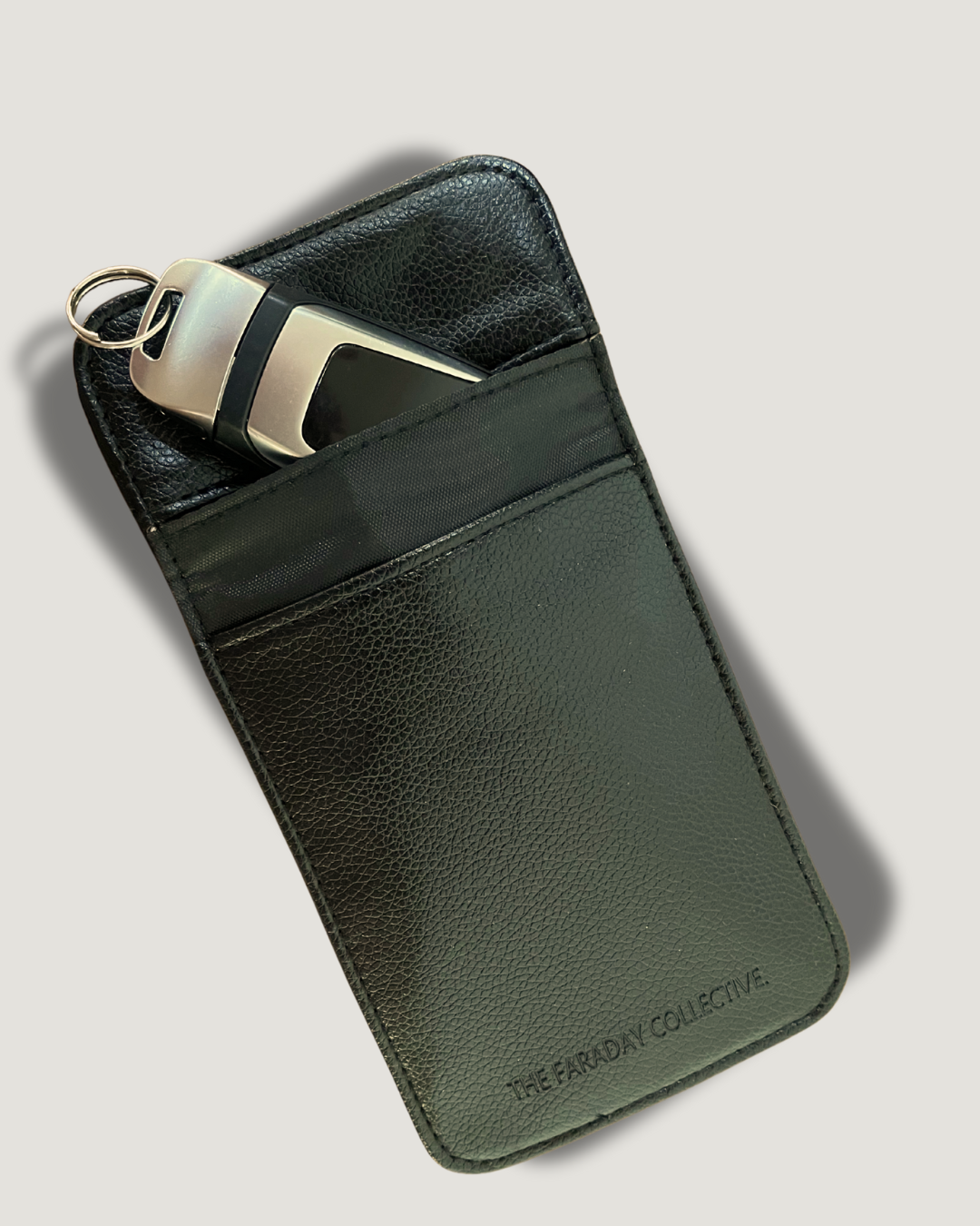 Tan Faraday pouch blocking RFID signals