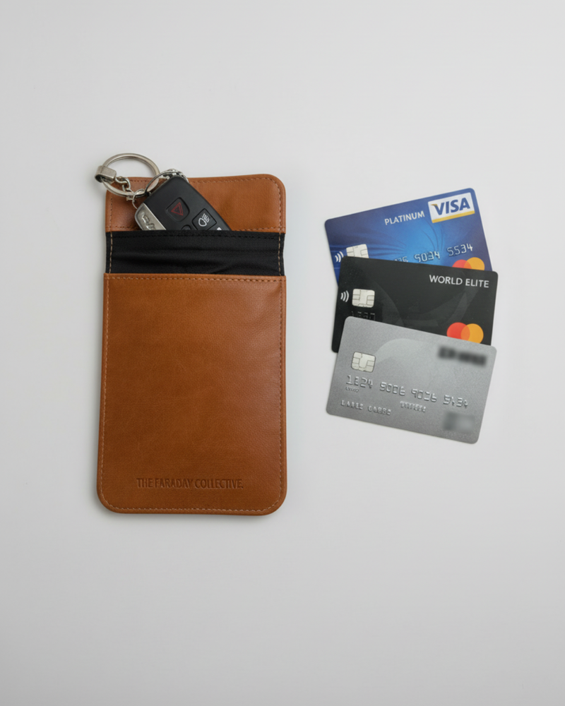 Brown leather look  pouch with  branding on a light gray background. Blocks RFID, EMF, wireless signals and more. Suits car fob keys and bank cards